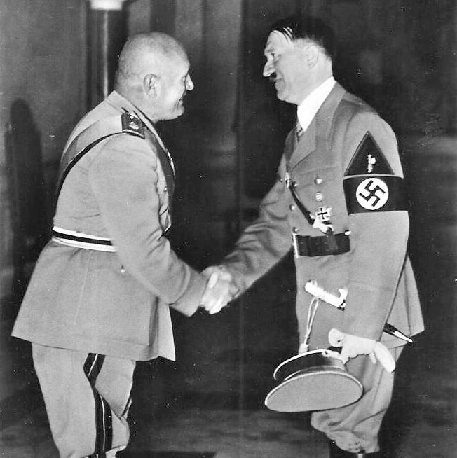 Hitler and Mussolini agreeing on a Treaty