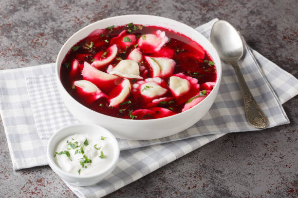 https://www.istockphoto.com/photo/barszcz-z-uszkami-beetroot-soup-borsch-with-small-dumplings-closeup-on-the-plate-gm1939760011-556528628