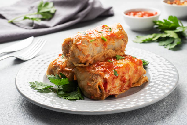 https://www.istockphoto.com/photo/cabbage-rolls-with-beef-rice-and-vegetables-on-the-plate-stuffed-cabbage-leaves-with-gm1226930374-361665114