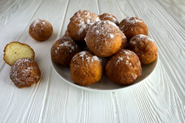 https://www.istockphoto.com/photo/homemade-cottage-cheese-donuts-on-the-white-wooden-background-gm1336515176-417752335