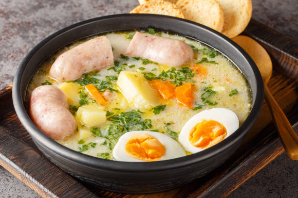 https://www.istockphoto.com/photo/polish-zurek-a-rich-soup-soured-with-fermented-rye-starter-served-with-a-boiled-gm1957167840-557580134